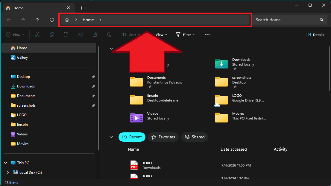 A Windows File Explorer window. The address bar near the top is circled in red, with a red arrow pointing up at it.